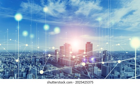 Modern cityscape and communication network concept. Smart city. - Shutterstock ID 2025425375