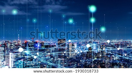 Modern cityscape and communication network concept. Telecommunication. IoT (Internet of Things). ICT (Information communication Technology). 5G. Smart city. Digital transformation.