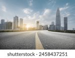 Modern Cityscape with Open Road at Sunrise