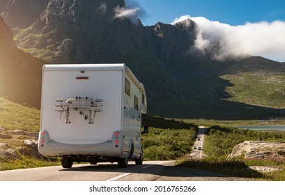 Modern Class C Camper Van RV On The Lofoten Road Trip During Summer Road Trip. Sunny Day In The Archipelago