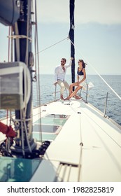 Modern Classy Couple Cruising Together On The Yacht