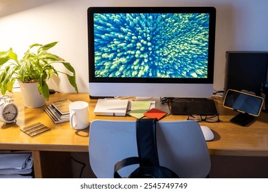 Modern And Clean Home Office Desk With Desktop, Plant, And Mug For A Professional And Relaxed Work Environment.Organized Workspace With Monitor, Keyboard, And Colorful Stationery For Efficient Work  - Powered by Shutterstock