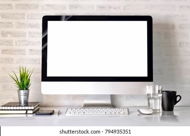 Modern Clean Workspace Mockup With Blank Screen Desktop Computer And Office Supplies.