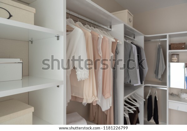 Modern Closet Clothes Hanging On Rail Stock Photo Edit Now