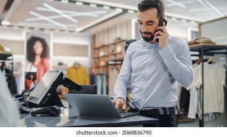 Modern Clothing Store: Friendly Customer Support Specialist Talks To Client On The Smartphone. Smiling Retail Sales Manager Or Young Designer Contacts Client About Online Order In Fashion Shop