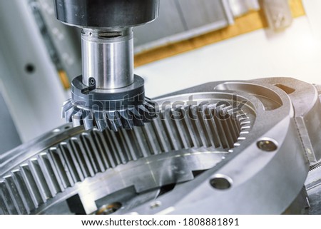 A modern CNC milling machine makes a large gear wheel. Gear ring with internal tooth arrangement.