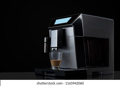 Modern coffee machine with fl  on dark background. Poster concept