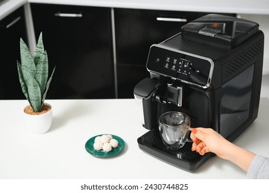 Modern coffee machine in kitchen,