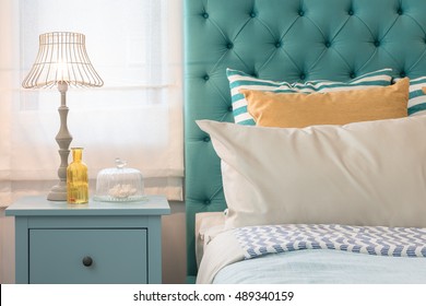 Modern Colorful Bedroom Design With Lamp On Blue Table Side