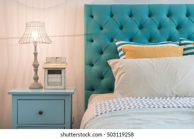 Modern Colorful Bedroom Design With Lamp On Blue Table Side