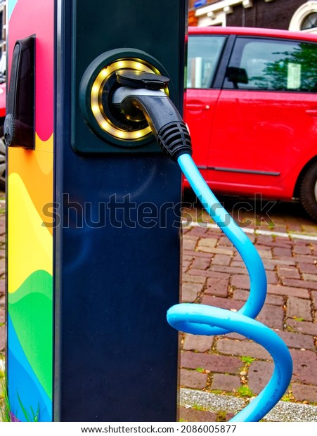 modern colorful\
electrical car charging\
column
