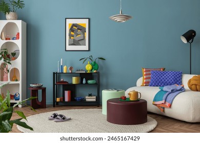 Modern and colorful interior of living room with design boucle sofa, mock up poster, shelf, plants, decorations and personal stuff. Home decor.	