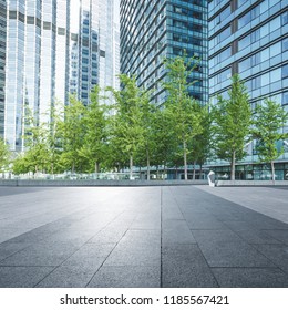 Modern Commercial Buildings And Urban Green Landscape Belts.