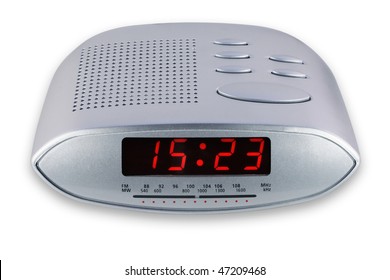 Modern Compact White  Digital Electronic Clock With Analog Radio Scale. It Is Isolated On The White, With Clipping Path. Mass Production.