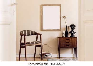 Modern composition of living room interior with brown mock up poster frame, design retro commode, vintage chair, flowers in vase and elegant accessories. Template. Stylish home staging. Japandi. - Shutterstock ID 1833895039
