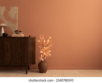 Modern composition of living rorrm interior with mock up poster frame, copy space, wooden sideboard, brown vase with flowers, books, sculpture, bowl and personal accessories. Home decor. Template. 