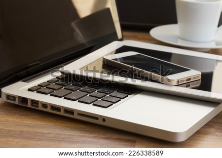 modern computer gadgets  - laptop, tablet and phone close up