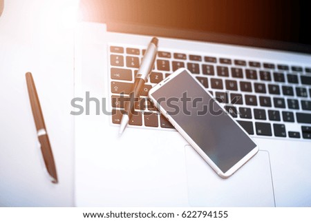 modern computer gadgets - laptop, tablet and phone close up