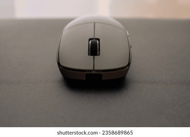 Modern computer mouse on the desk. Wireless mouse gaming