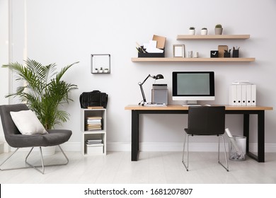 Modern computer table in office interior  Stylish workplace