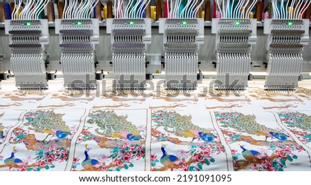 Modern computer programmable embroidery machine in garment industry.