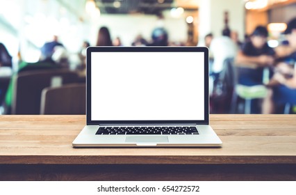 Modern Computer,laptop With Blank Screen On Table With Blur Cafe,restaurant Backgrounds
,