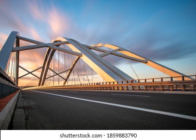 Modern Construction Highway Bridge At Sunset