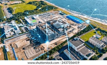 Modern construction site and wireless communication network concept. Smart factory. Industrial Internet of Things. IIoT.