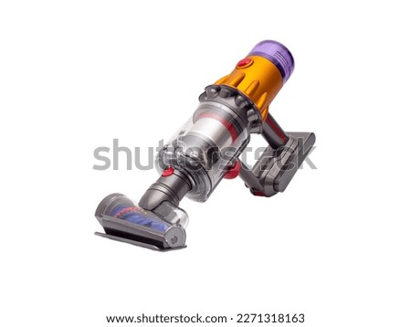 Modern cordless vacuum cleaner isolated on white background. Powerful cordless colorful cyclonic dust collection. New technologies.