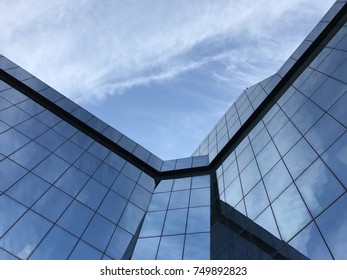 Modern Corporate business glass building and blue sky
