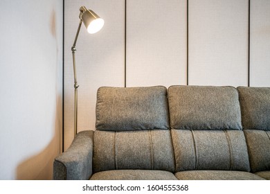 Modern Couch And Lamp In a Room Stock Photo
