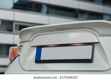 Modern Coupe Car Rear Trunk Spoiler. Number Plate With Free Space At The Boot Of A Car