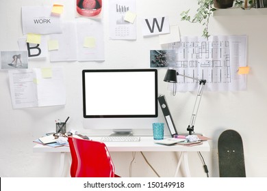 Modern Creative Workspace With Computer And Red Chair. The Office Of A Creative Worker.