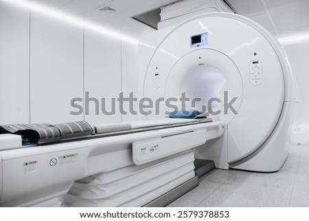 Modern CT scanner or MRI machine in a hospital radiology center. Diagnostic equipment in a medical lab.