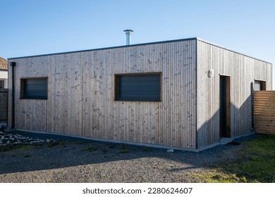 modern cube little wooden house square facade contemporary home extension from street - Powered by Shutterstock