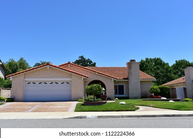   A modern custom-built luxury house in a residential neighborhood of Agoura Hills, California.   
