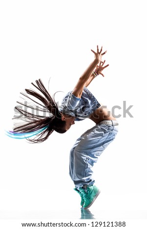 modern dancer poses in front of the studio background