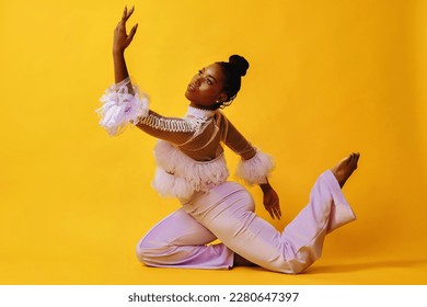 modern dancer in studio floor pose