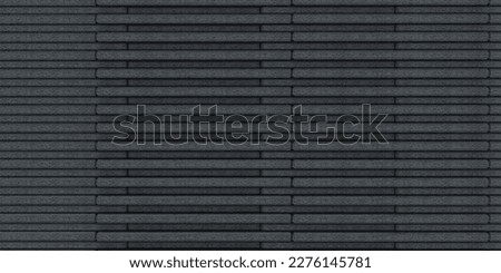 The modern dark gray stone tile wall background and texture