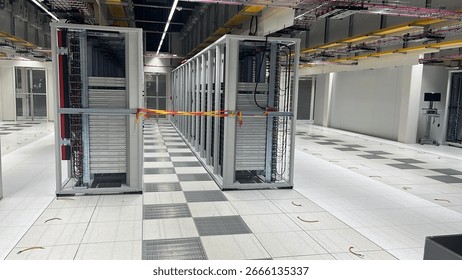 Modern data center with rows of server racks and clean interior