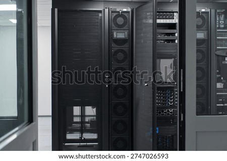 Modern data center with server racks and network equipment inside a secure IT room for enterprise infrastructure