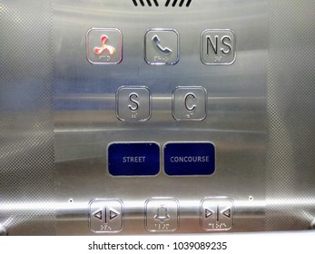 A modern day lift with stainless steal interiors seen with big buttons for aged people and Braille dots for blind people