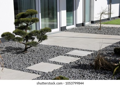 Modern Decorative Garden With Grey Terrace Tiles