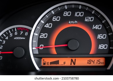 Modern design of analog speedometer and tachometer with digital fuel gauge from car dashboard instrument