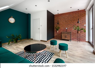 Modern Designed Living Room With Brick Wall And Amazing Emerald Green Wall And Furniture