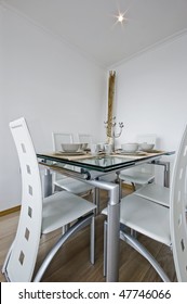 modern designer dining table with setup and accessories