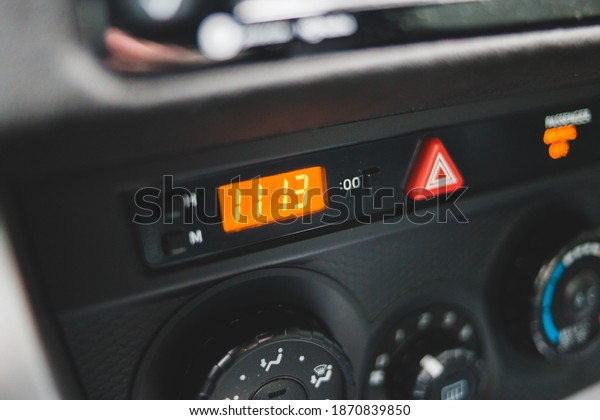 modern digital car clock in\
dash
