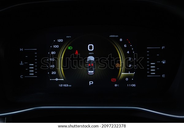 Modern digital car\
mileage. Car dashboard with sensors and information. RPM, Fuel\
indicator and\
temperature.