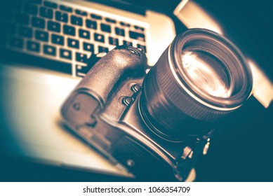 Modern Digital Photography Equipment. Camera and the Computer For Post Processing.