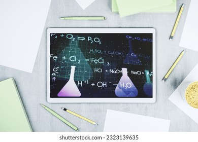 Modern digital tablet monitor with creative chemistry illustration, research and development concept. Top view. 3D Rendering